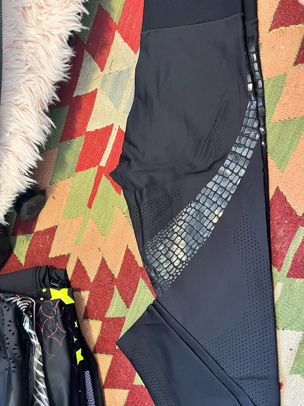 ultracor Black leggings with shiny alligator print and laser cutouts size L